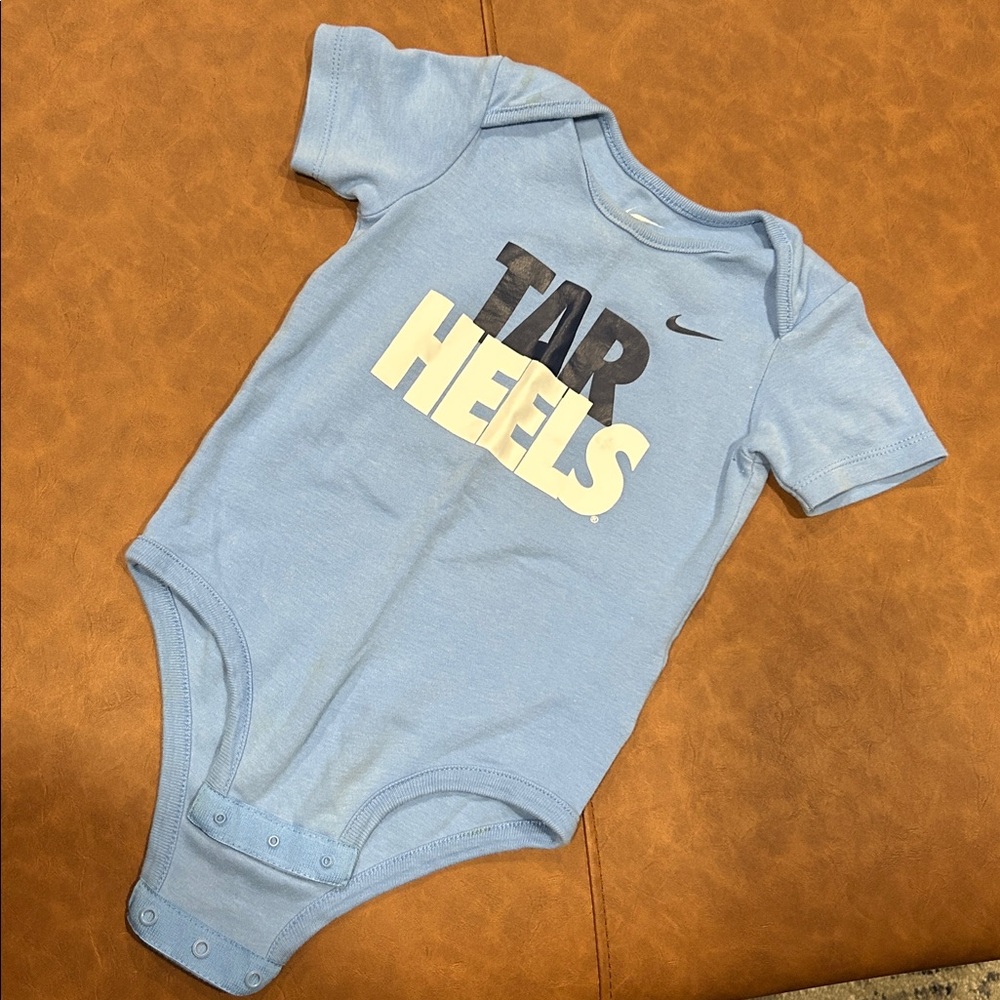 Nike Tar Heels Baby Onesie